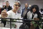 Artist C.J. Fleury, left, explains her concept for the Art Fence, on display at the Bronson Centre on November 8, 2012.