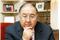 Russian billionaire Alisher Usmanov sits in his office in Moscow September 3, 2007. A firm co-owned by Usmanov said on August 30, 2007 it had bought a 14.6 percent stake in UK soccer club Arsenal from former Vice Chairman David Dein for 75 million pounds ($150.6 million). Picture taken on September 3, 2007.