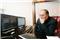 Russian billionaire Alisher Usmanov sits in his office in Moscow September 3, 2007. A firm co-owned by Usmanov said on August 30, 2007 it had bought a 14.6 percent stake in UK soccer club Arsenal from former Vice Chairman David Dein for 75 million pounds ($150.6 million). Picture taken on September 3, 2007.